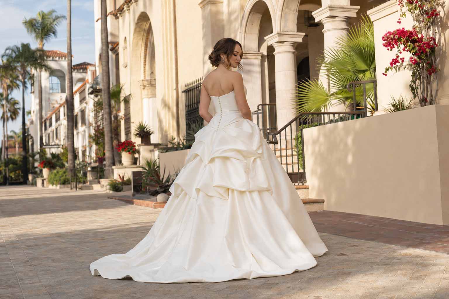American Bustle—Southern San Diego: Bride wearing an American over-bustle wedding dress in an elegant San Diego setting.