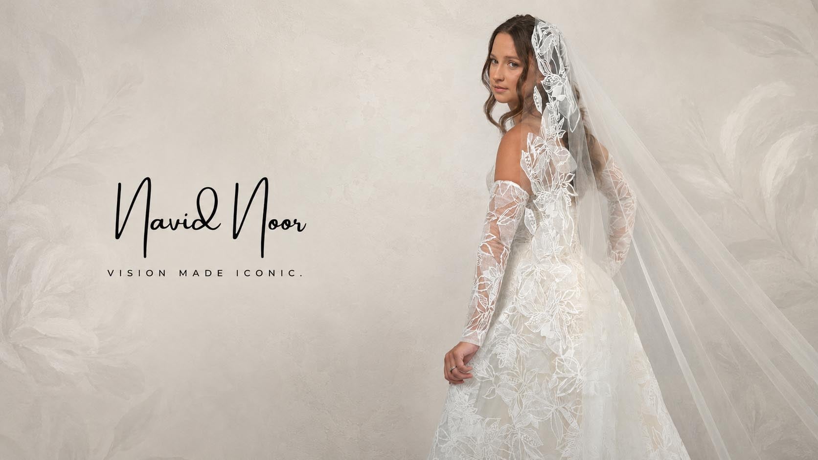 Bride in a floral applique wedding dress from the Navid Noor couture collection at Bridal and Tuxedo Galleria San Diego.