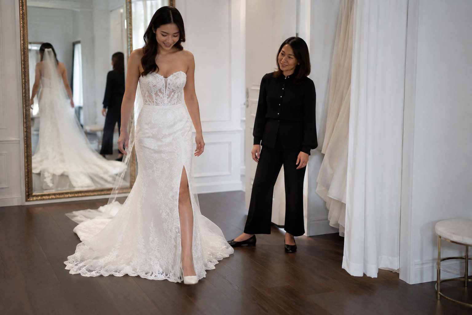 Bride having her wedding gown professionally evaluated at Bridal & Tuxedo Galleria